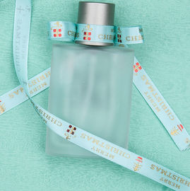 Nastro su ordinazione dell'imballaggio del regalo di Parfums, nastro del raso del poliestere dell'oro 9mm con stagnola