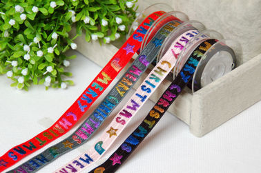 Oro dell'arcobaleno sulla decorazione di polsino del nastro del regalo personale elastico